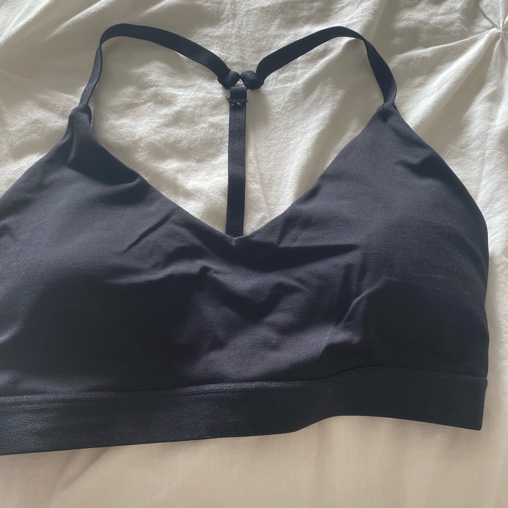 Lightly padded stylish sports bra. Never worn.